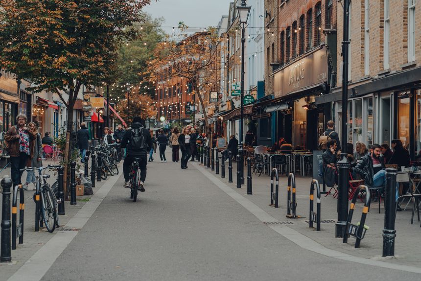 London, UK - October 23, 2021: People on Exmouth Market, a semi-pedestrianised street in Clerkenwell, Islington, and a famous street market.