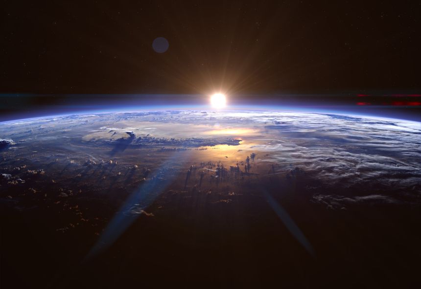 Sunrise over planet Earth, view from space. The Sun rises on the horizon. Beautiful blue planet Earth in outer space on background of stars. View from orbit to planet Earth. Elements of this image furnished by NASA. ______ Url(s): 
https://images.nasa.gov/details-iss007e10807
https://images.nasa.gov/details-iss060e022358
Adobe Photoshop CC 2023. Knoll light factory. Adobe After Effects CC 2021.