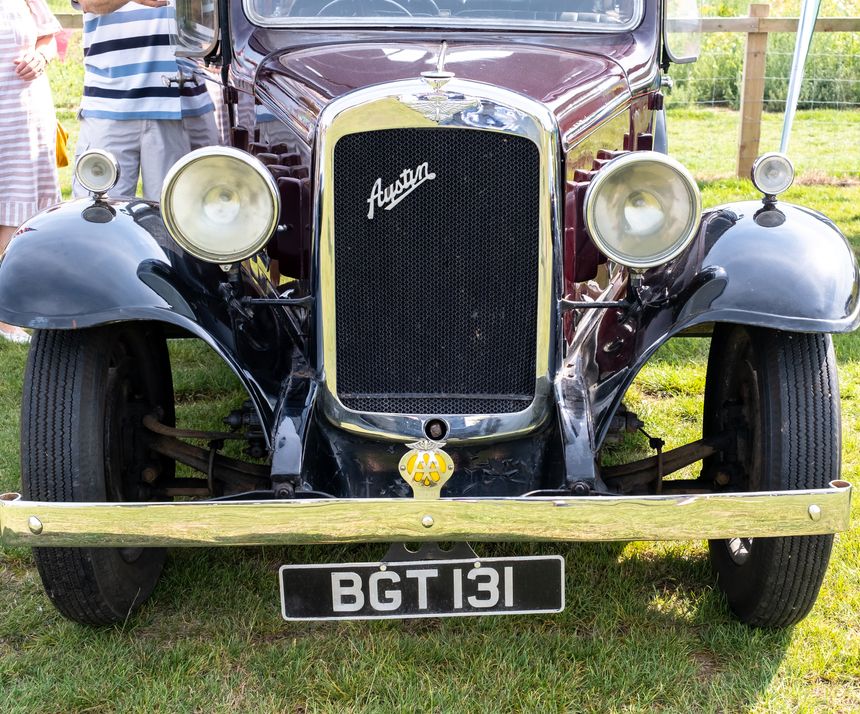 Wroxham, Norfolk, UK September 10 2023. The front end, grille, headlights, bumper and bonnet of a classic Austin 7 car