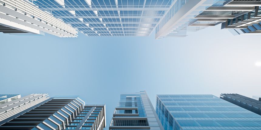 3D rendering of high rise building in overhead or look-up view with open empty sky space in the background for concepts of business, real estate, urban development and property marketing.