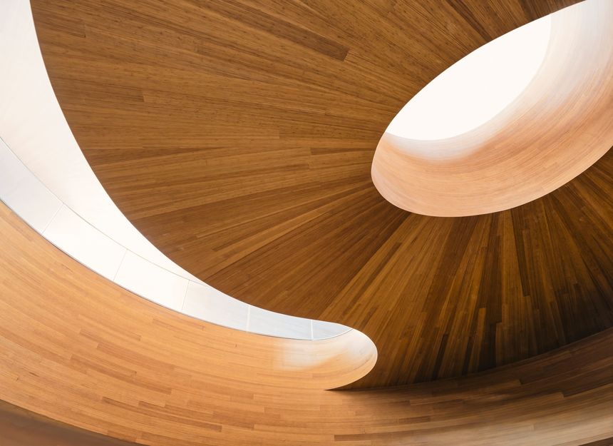 Wooden Spiral curve Warm color sunlight Architecture details Abstract background