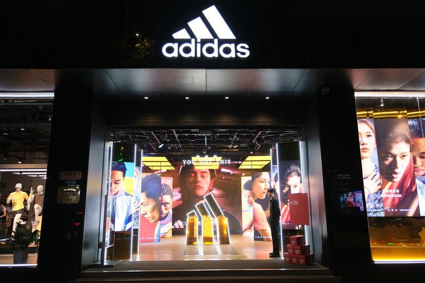 Shanghai,China-July 20th 2024: large Adidas retail store facade at night