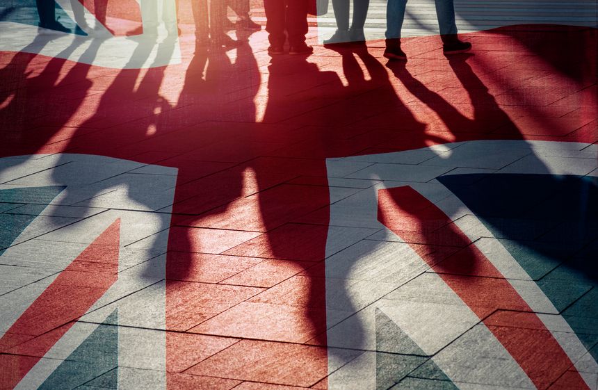 UK flag and shadows of people - concept picture