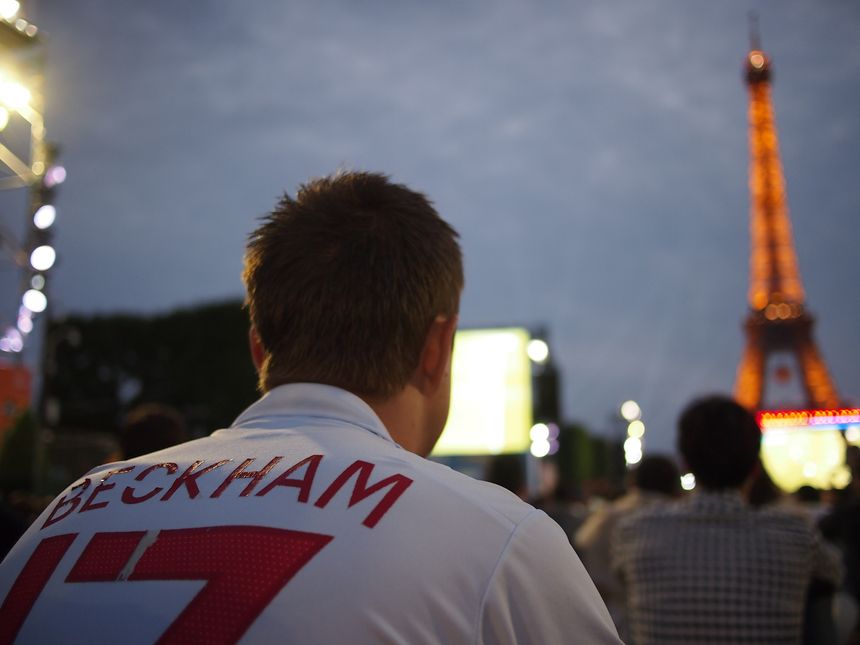 Paris, France - June 27, 2016: Fans watch England lose to Iceland at the iconic fan zone underneath the Eiffel Tower