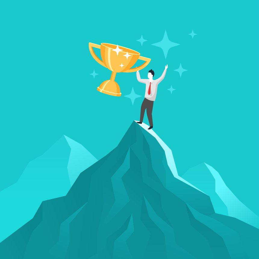Career and success concept - man on mountain top with first place golden cup - challenge, competition and goal achievement