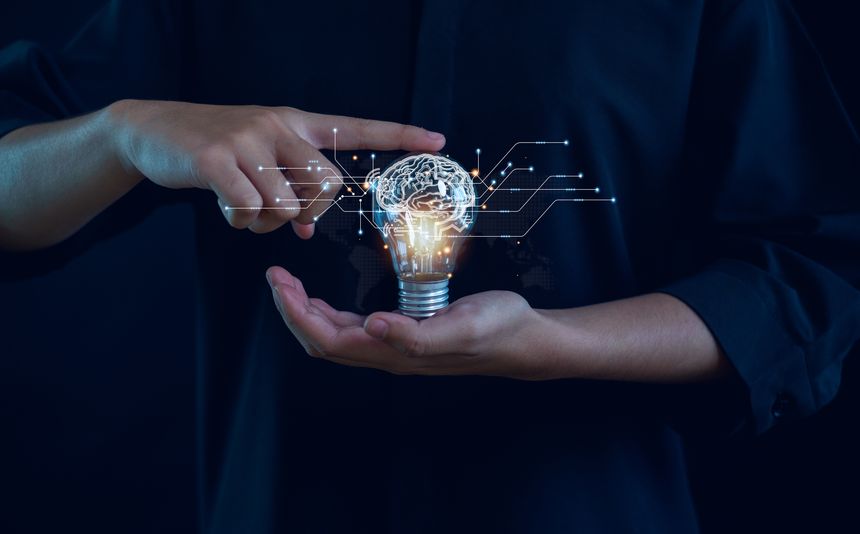 Hand of  holding illuminated light bulb, Idea innovation and inspiration concept.  creativity with bulbs that shine glitter, Concept for success.