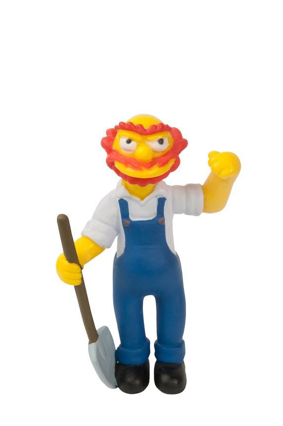 Adelaide, Australia - May 4, 2015: A studio shot of a Groundskeeper Willie Figurine from the animated series The Simpsons. The Simpson is an extremely popular worldwide TV Series.