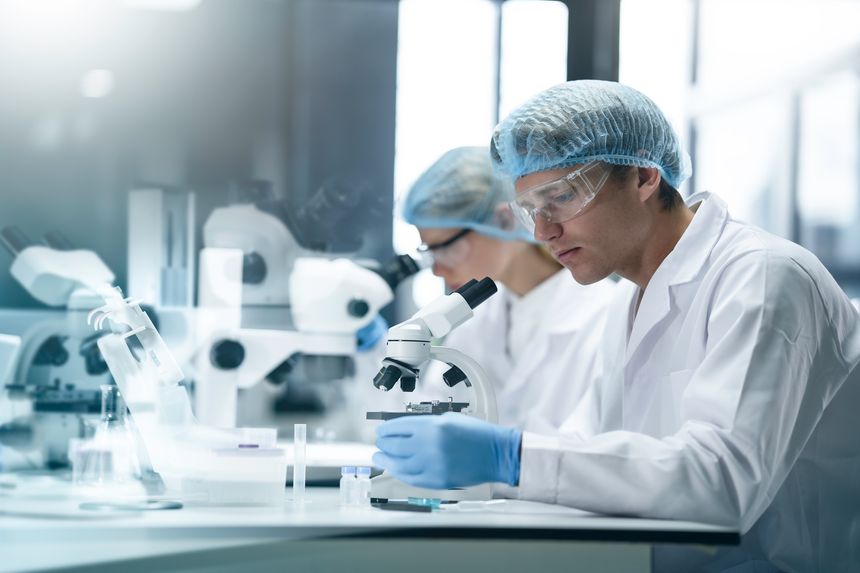 Medical, Research and scientist team working in laboratory with microscope, observation, analysis and experiment for study. Biotechnology Research for examine cells, microorganisms. Health care