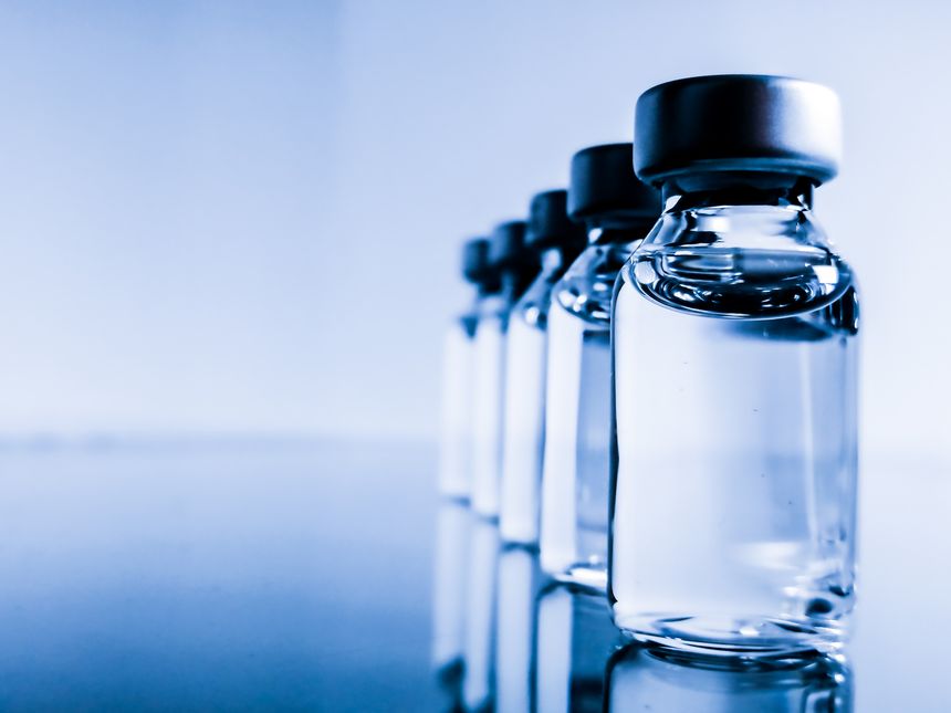 Image of bottle light blue background