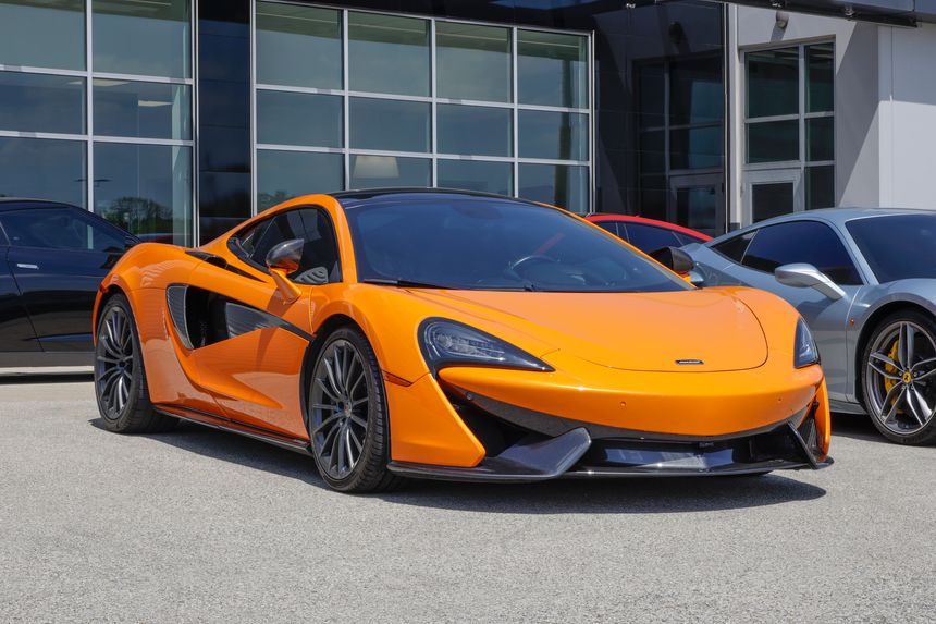 Indianapolis - April 23, 2026: McLaren 570GT Base display at a dealership. McLaren offered the 570GT with a 3.8L Twin-Turbocharged V8 engine. MY:2018