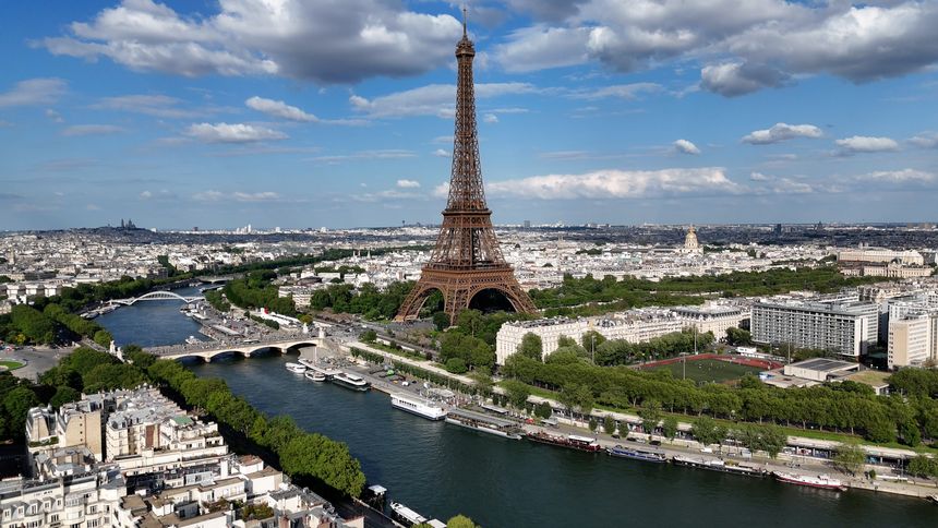 Paris Skyline At Paris In France Island France. Highrise Eiffel Tower. Downtown Cityscape. Paris Skyline At Paris In France Island France. Seine River Skyline. Metropolitan Region Aerial View.