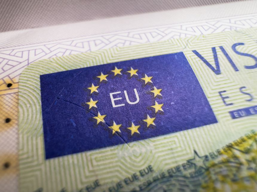 Visa in passport for world travel, EU visa for Spain, tour, airport, customs, news, closed borders, nationality. Macro photo. High quality photo