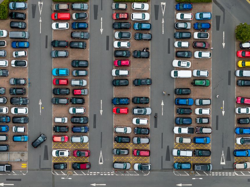 Overhead shot of a full car park, concept of transport and congestion