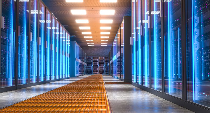 Modern server room with bright blue lights illuminating the corridor and server racks