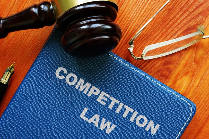 Conceptual photo showing printed text competition law