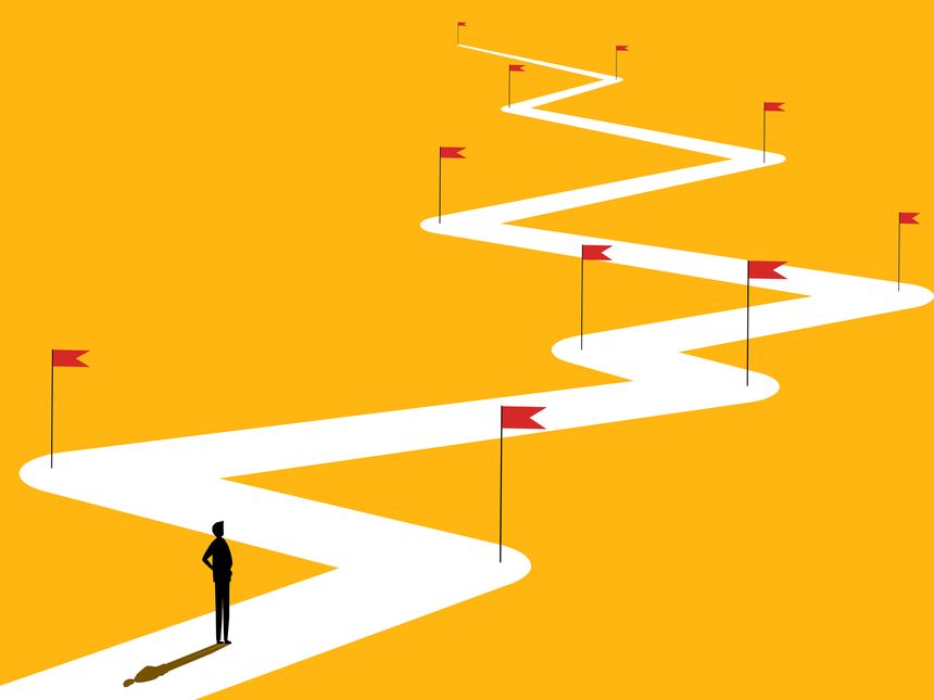 Businessman on the road with red flag, complicated path and goals to conquer. vector