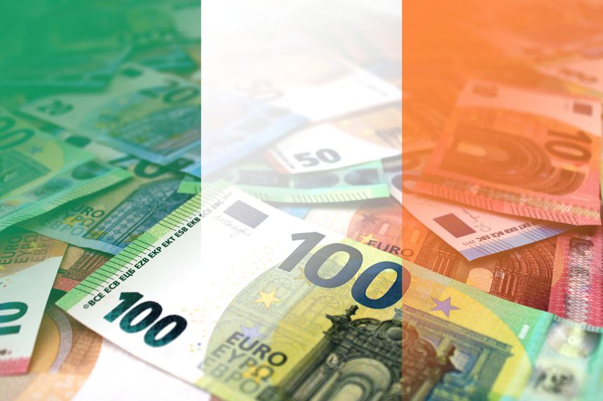 Gradient overlay of the Irish flag on the euro notes.