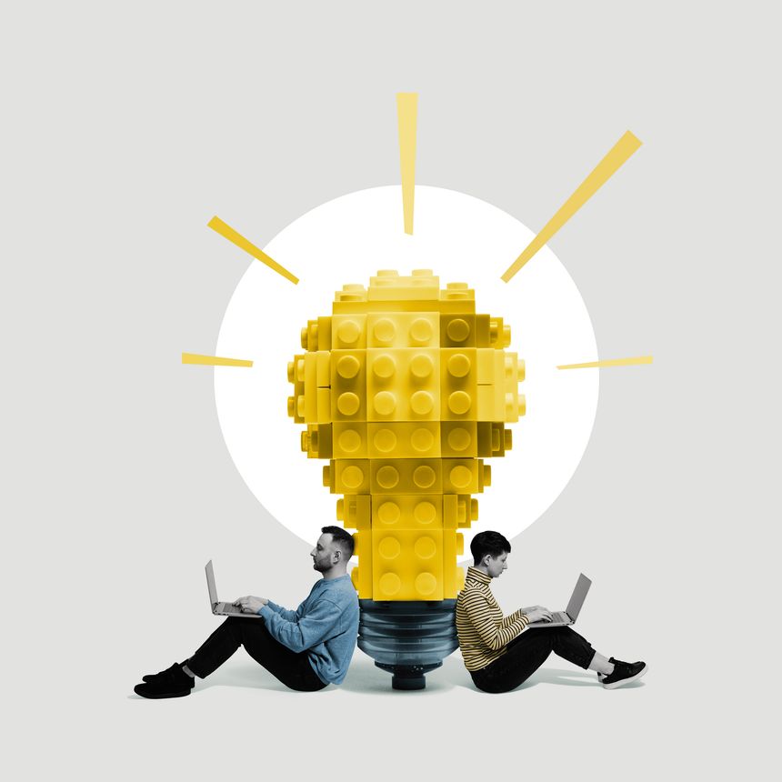 A man and a woman with laptops sit near a large light bulb made of blocks. Art collage.