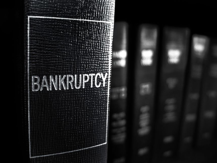 Bankruptcy book on shelf in libarary for learning and finances