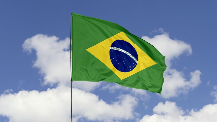 3d illustration flag of Brazil. Brazil flag isolated on the blue sky.