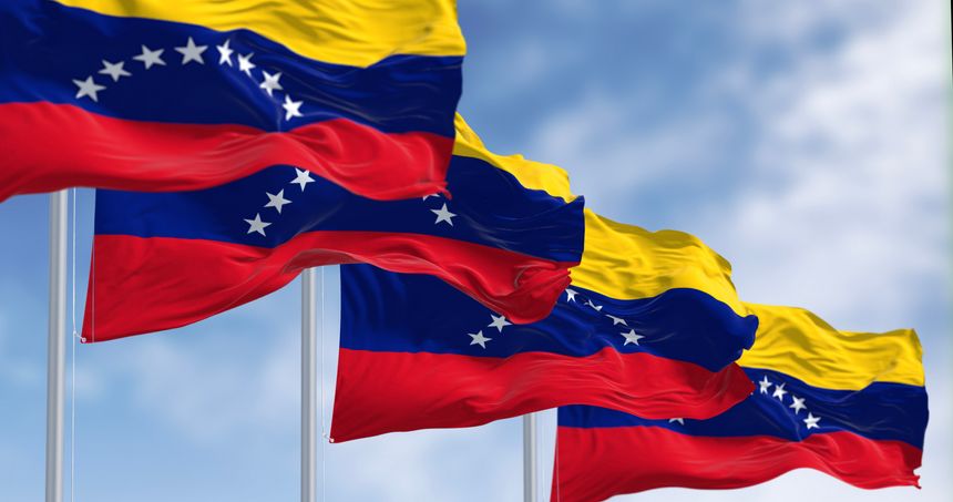 Venezuela national flags waving in the wind on a clear day. Tricolor of yellow, blue and red with an arc of eight white five-pointed stars in the center. 3d illustration render. Selective focus
