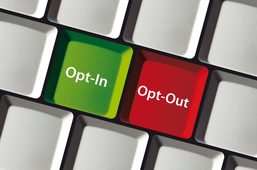 Closeup of a keyboard with green OptIn and red OptOut buttons, symbolizing a choice in digital interaction