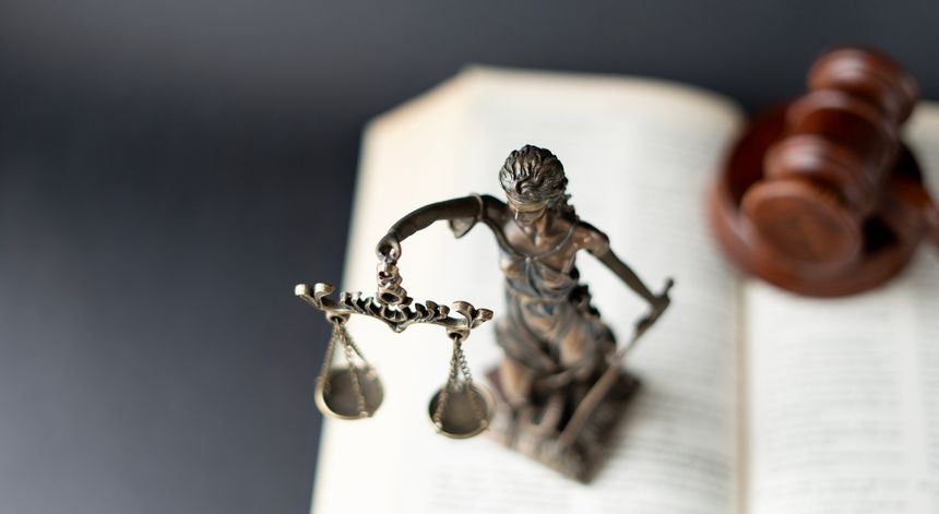 lady justice statue at courtyard