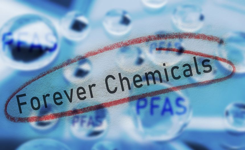 Water drops with PFAS text and Forever Chemicals circled in red -- water contamination concept