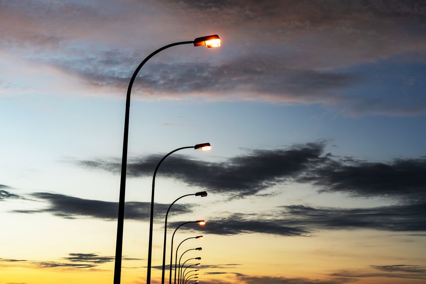 Lamp post against sunset sky Kota Kinabalu Sabah Malaysia