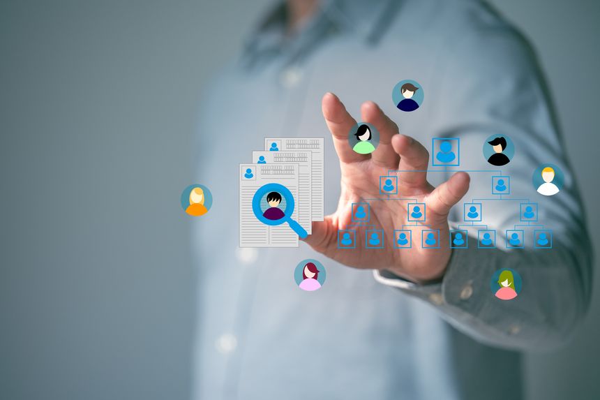 The Business man seek data to find a human data which are floating on screen