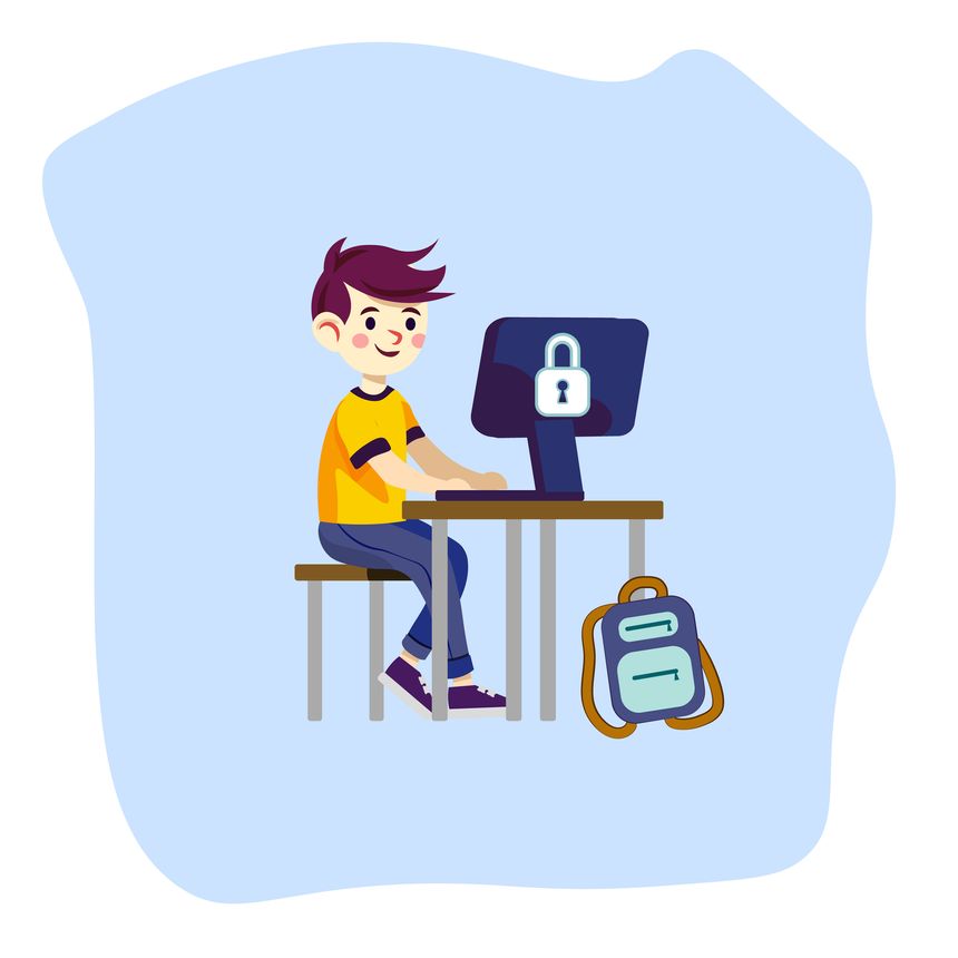 A boy sitting at a table using a computer. The computer screen shows a closed white padlock icon symbolizing online safety. Digital safety, online learning and children's interaction with technology.