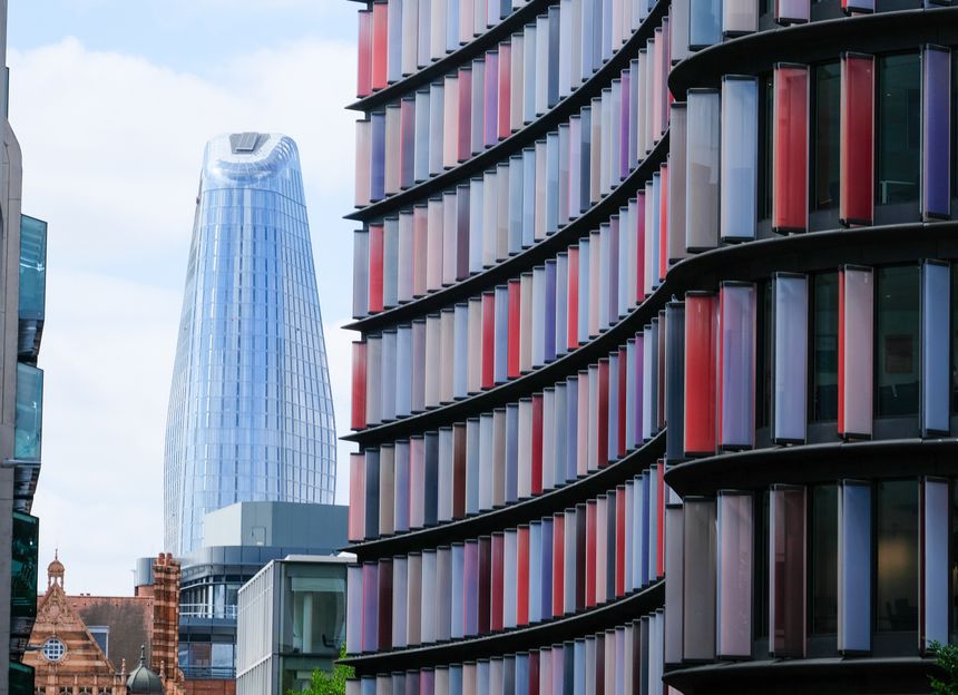 30th May 2019: Looking down Old Bailey in the City of London district, the changing face of London's skyline is striking. Opposite the Central Criminal Court, known as the Old Bailey, stands the colourful new building, with glass panels - Two New Ludgate also known as Mizuho House, designed by architects Sauerbruch Hutton and completed in 2015, occupied by Mizuho Bank London branch. Looking further on is One Blackfriars, nicknamed The Vase & The Boomerang, designed by architects SimpsonHaugh and completed in 2018 - It is an exclusive residential tower block, with high-end apartments and a hotel.