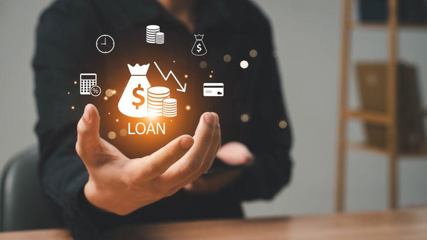 Online personal loan and financial concept. Financial loan agreement, Personal or business loans through online services between lenders and borrowers. Person using laptop laptop with loan icon.
