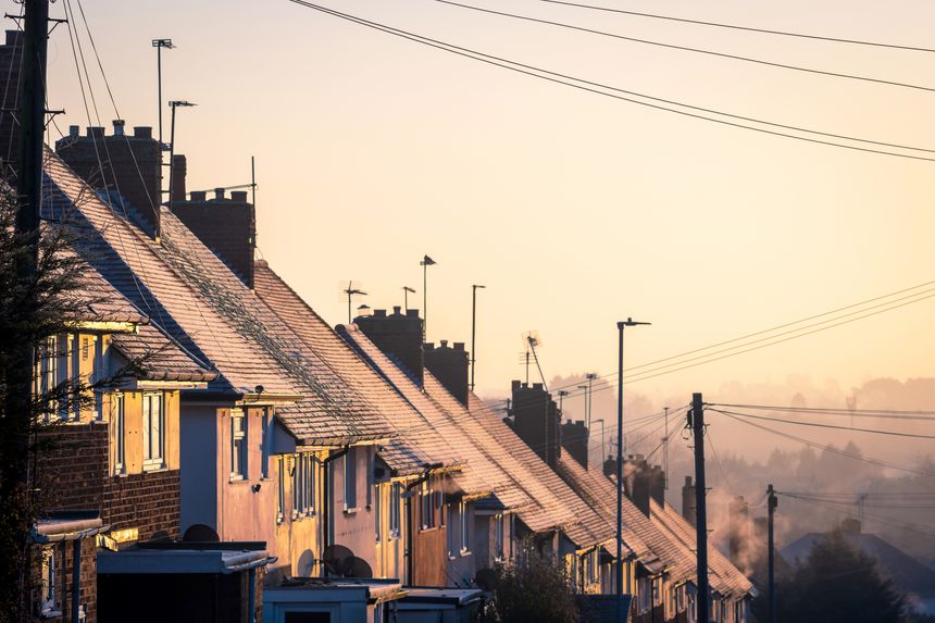 Frost snow covered british house roof in england uk.