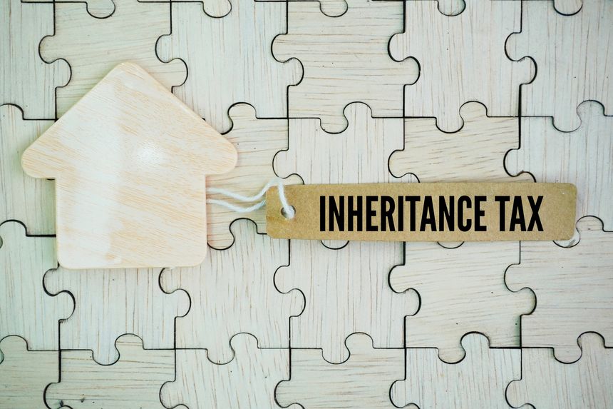 house form and paper tag with the word Inheritance Tax. An inheritance tax is a tax paid by a person who inherits money or property of a person who has diedinheritance, tax, house, background, business, construction, home, space, concept, sale, finance, law, insurance, investment, industry, financial, accounting, key, trade, loan, credit, mortgage, residence, property, rent, value, residential, capital, housing, legal, real estate agent, broker, landlord, plot, estate, subsoil, additional, association, buy, cost, financing, invest, land, living, precaution, purchase, real, save, single, society