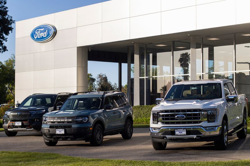 Sunnyvale, CA, USA - May 3, 2022: Ford pickup trucks and SUVs are seen displayed outside a Ford dealership store in Sunnyvale, California. Ford Motor Company is an American automobile manufacturer.