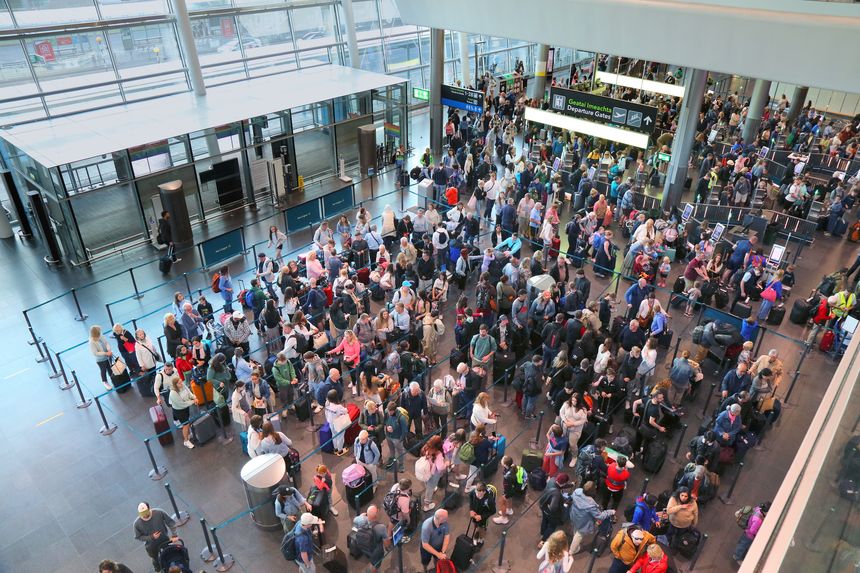Passengers crowd at Dublin Airport, Ireland.