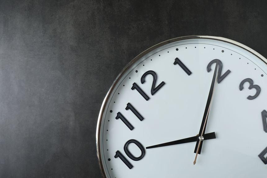 Wall clock on a colored background