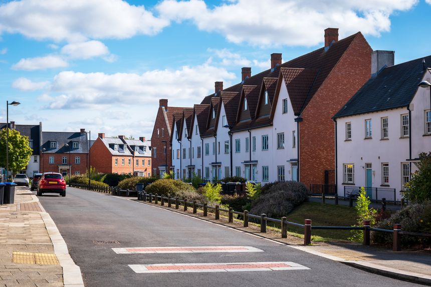 traditional detached house within residential estate in England UK.