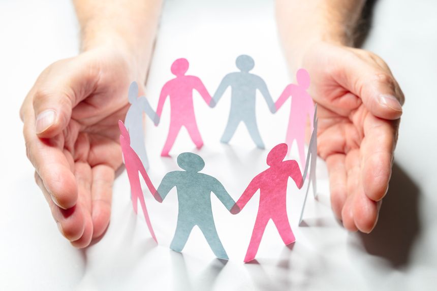 Paper chain friends, teamwork, diversity, inclusion, family or business community, hand holding and protecting