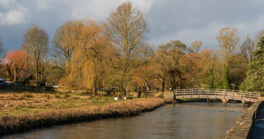 The River Coln through Bibury a picturesque village in The Cotswolds, Gloucestershire,United Kingdom