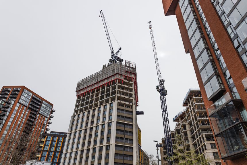 Urban construction site with cranes and tall buildings being developed in city center. London, UK, 6 April 2024
