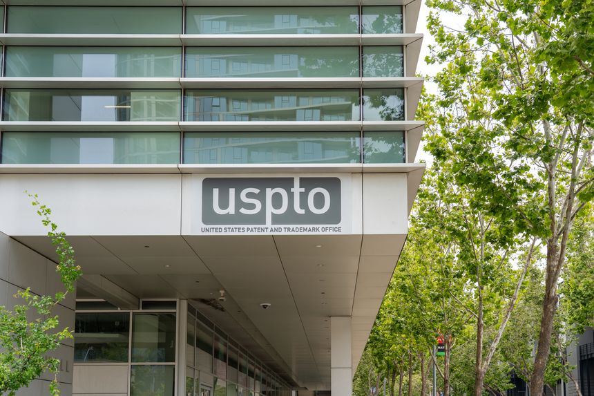 San Jose, CA, USA - June 10, 2023: The sign of USPTO (United States Patent and Trademark Office) at the City Hall in San Jose, California, USA.