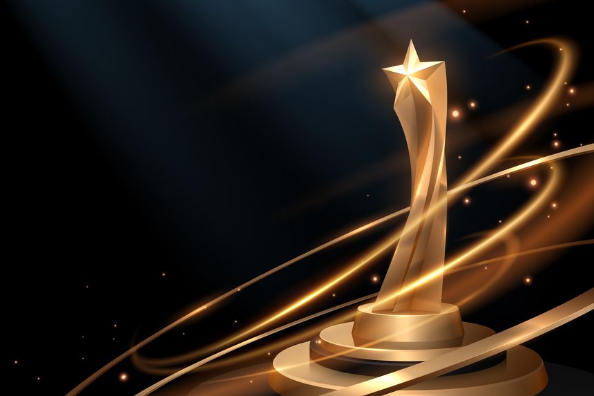 Golden star trophy with light effects in vector