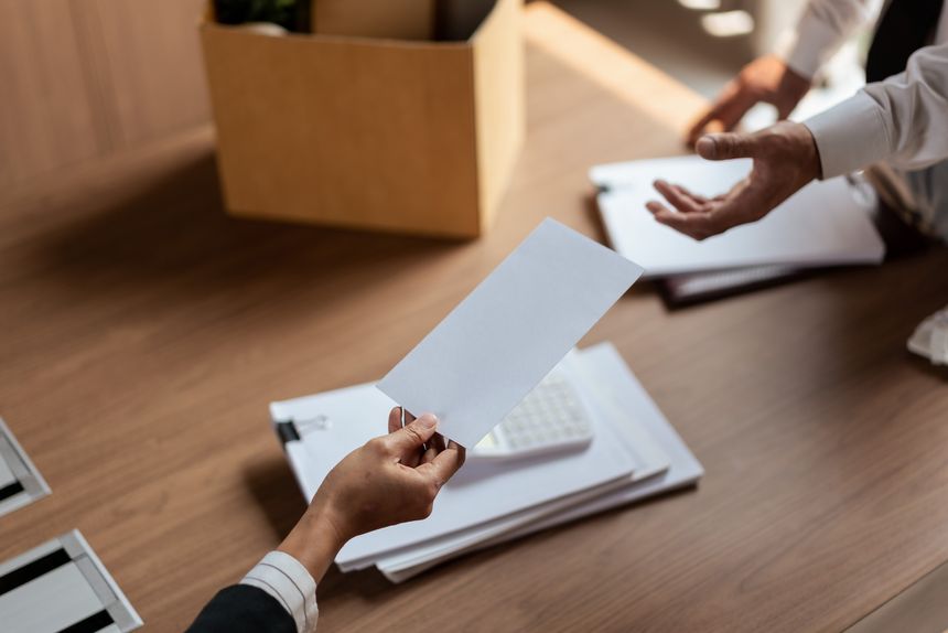 Female employer sending resignation letter to male employee for cancel contract and layoff job.