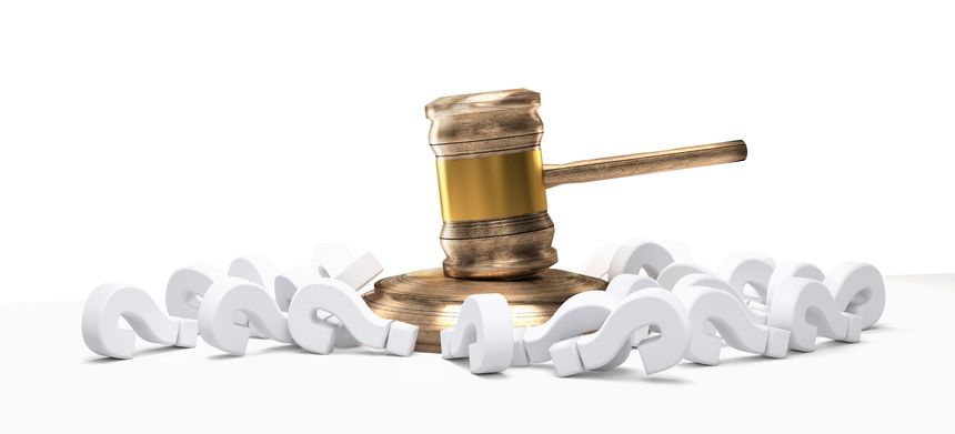 wooden judge gavel and question marks 3D-Illustration isolated