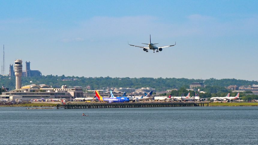 Washington DC, USA - 1 May 2024: Passenger plane landing at Ronald Reagan National Airport on the banks of the Potomac River in Washington DC.