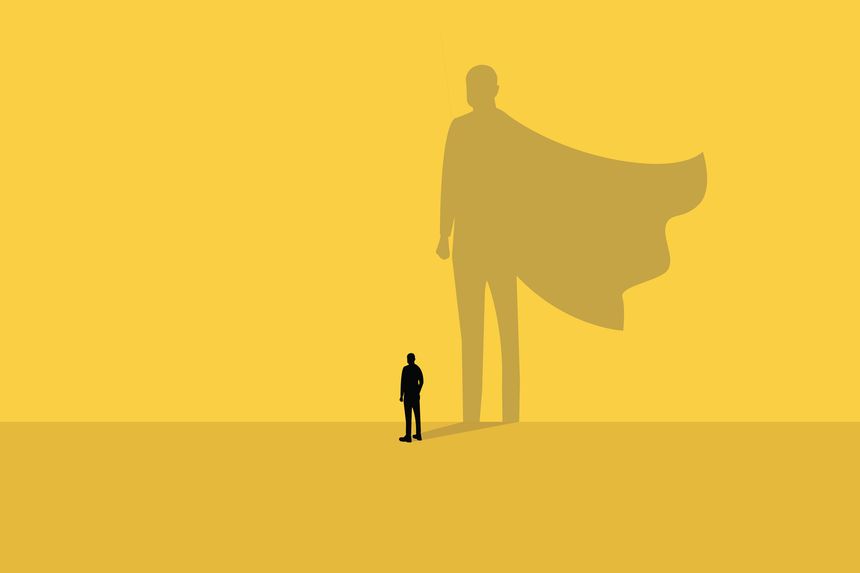 Businessman turned into or shadow a superhero. Concept of success, Leadership and teamwork