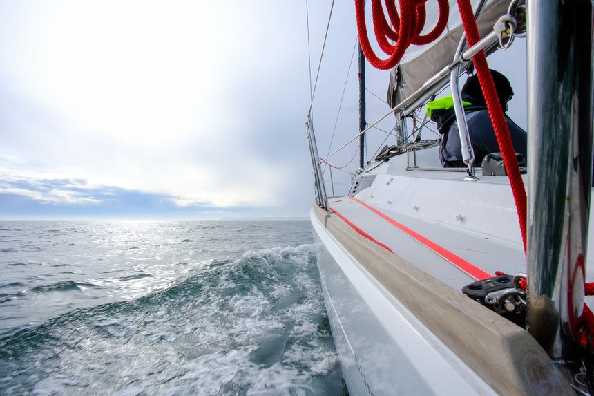 23 March 2025 - A Sailing Yacht racing and moving quickly throuhg the water, sailing in the atmospheric conditions of the English Channel.