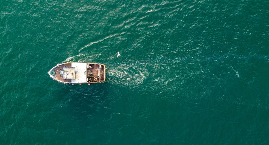 A small fishing trawler off the coast of Ayrshire, Scotland.